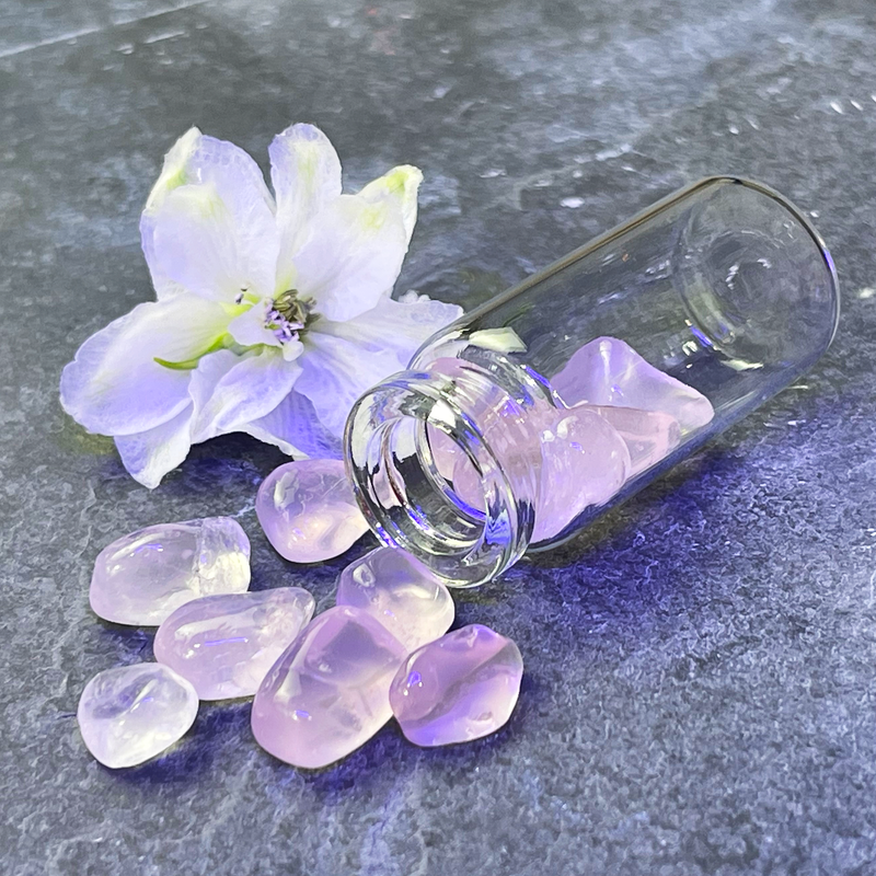 Rose Quartz Stones in a Glass Jar with a Backing Card