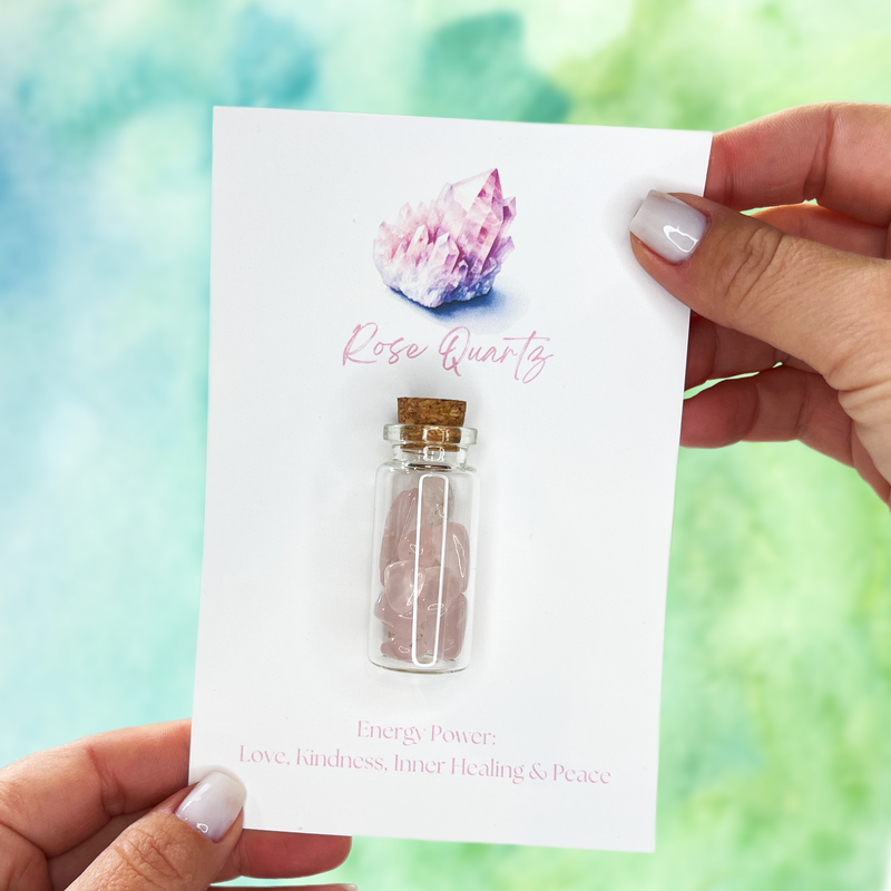 Rose Quartz Stones in a Glass Jar with a Backing Card