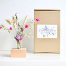 Wooden holder with dried flowers pink