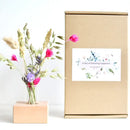 Wooden holder with dried flowers pink
