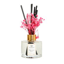 Clear Bottle Diffuser with White and Pink Flowers